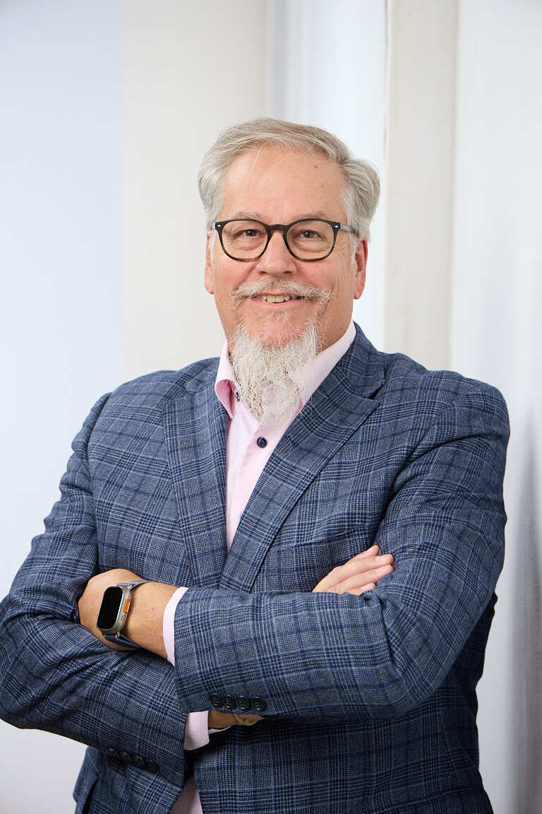 Ed Marsh, organic revenue growth consultant, in a navy blazer
